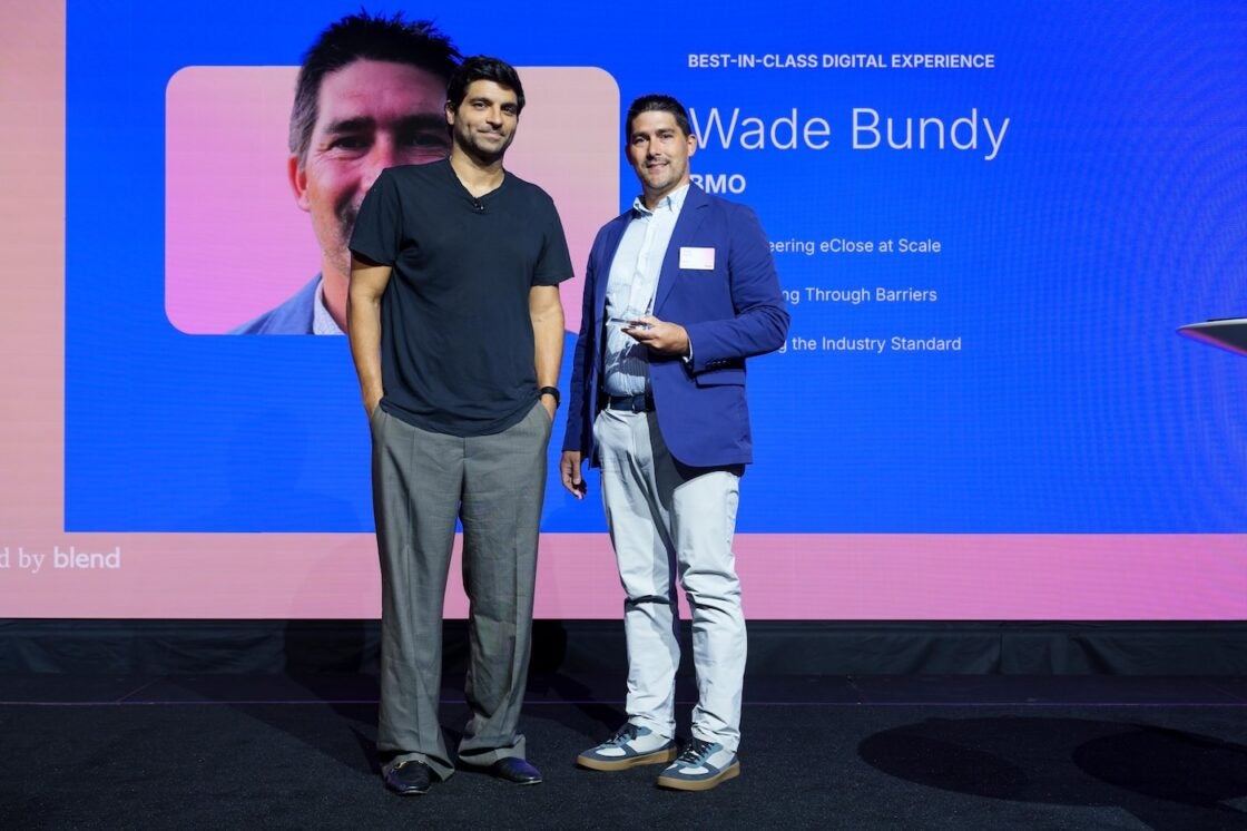 Head of Blend, Nima Ghamsari, on stage with Wade Bundy of BMO, recipient of the "Best-in-Class Digital Experience" Best in Banking Award for 2025.