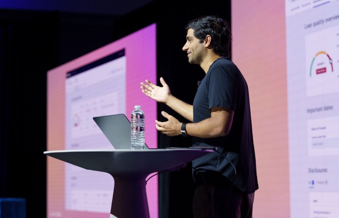 Photo of Nima Ghamsari, Co-Founder and Head of Blend, on stage at Forum 2025.